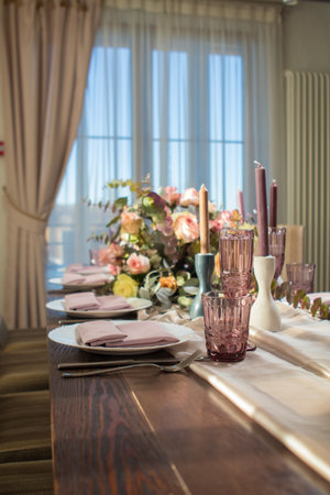 Festive table decorations, flowers and tableware, beautiful table setting for guests