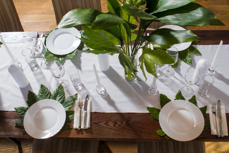 Decorative elements for festive events, home decorations. Festive table decorations, flowers and...