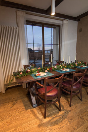 Decorative elements for festive events, home decorations. Festive table decorations, flowers and tablewareの写真素材