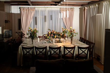 Festive table decorations, flowers and tableware, beautiful table setting for guestsの写真素材