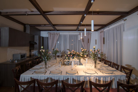 Decorative elements for festive events, home decorations. Festive table decorations, flowers and tablewareの写真素材