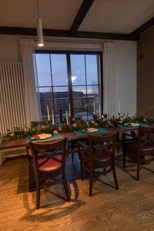 Decorative elements for festive events, home decorations. Festive table decorations, flowers and tablewareの写真素材