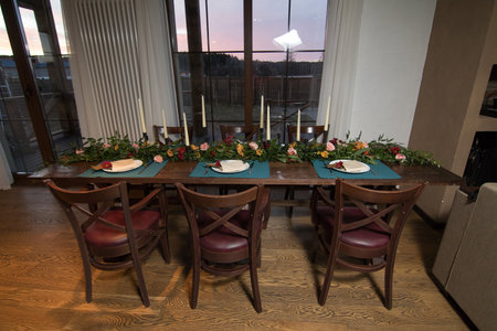 Decorative elements for festive events, home decorations. Festive table decorations, flowers and tablewareの写真素材