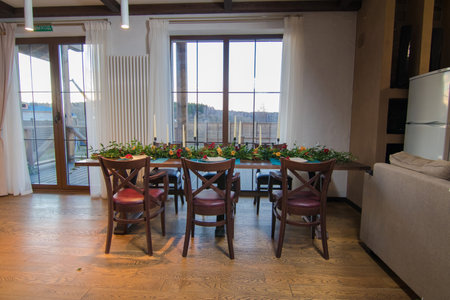 Decorative elements for festive events, home decorations. Festive table decorations, flowers and tablewareの写真素材