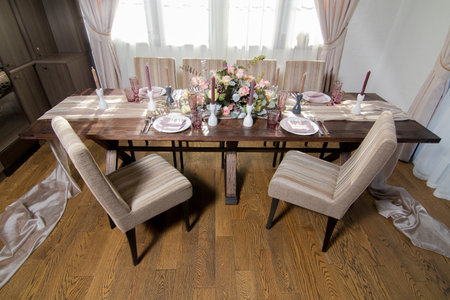 Decorative elements for festive events, home decorations. Festive table decorations, flowers and...