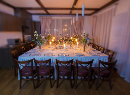 Decorative elements for festive events, home decorations. Festive table decorations, flowers and tablewareの写真素材