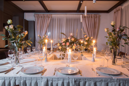 Decorative elements for festive events, home decorations. Festive table decorations, flowers and tablewareの写真素材
