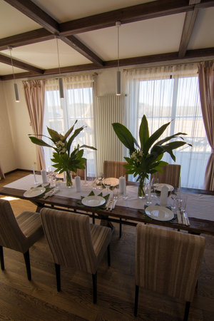 Decorative elements for festive events, home decorations. Festive table decorations, flowers and tablewareの写真素材