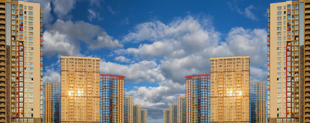 City view, modern buildings and skyscrapers against the blue sky.