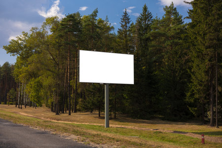 Background for design, white billboards along roads in the summer dayの写真素材