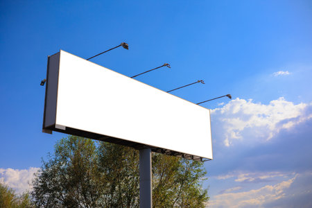 Background for design, white billboards on city streets and along roads in the summer dayの写真素材