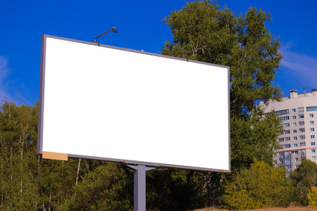 Background for design, white billboards on city streets and along roads in the summer dayの写真素材