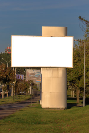 Background for design, white billboards on city streets and along roads in the summer dayの写真素材
