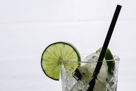 Close-up of cocktail with mojito ingredients and lots of crushed iceの写真素材
