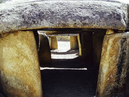 Interior of a dolmen in the Iberian Peninsula Large stone orthostats from prehistoric timesの写真素材