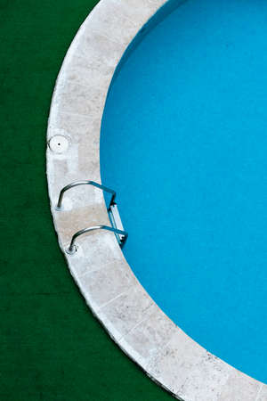 Summer pool creating geometry with artificial grass Conceptual of vacation, tourism, relax