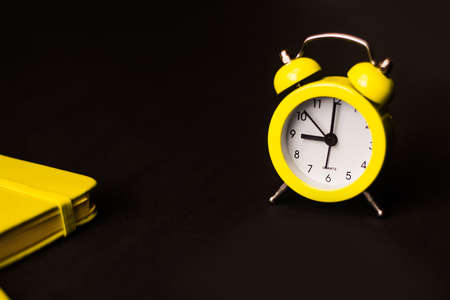 Defocus caucasian blond woman talking on the phone outside, outdoor. 40s years old woman in purple blouse in park. Serious person using mobile, smartphone. Copy-space. Side view. Out of focus.の写真素材