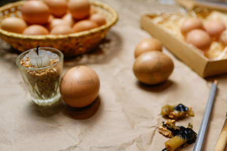 Tools for decorating Paschal eggs, Pysankas. Workplace. Rustic background. Collection of eggs....