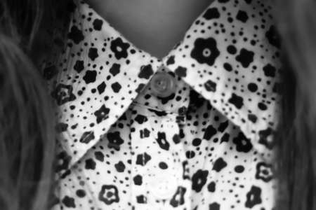 Defocus collar on classic white women's shirt, close up. Double simple straight stitch, fashion...