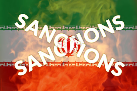 Defocus Iran sanctions concept. Iranian flag, concept on the topic of sanctions in Iran. Words. Fire...