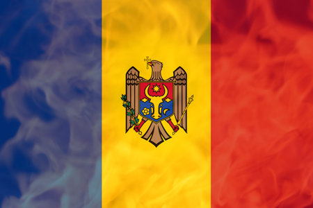 Defocus protest in Moldova. Moldova flag painted on fire flame background. Strength, Power, Protest concept. Russia war. Out of focus.の写真素材