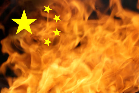 Protests China flag. Chinese real estate and debt crisis. Zero covid and lockdown protest in China. Revolution demonstration. Communism. Kill protesters. Fire flame.の写真素材