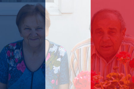 Protests France Paris. France flag. Protest in France. Pension reforms. Retirement age. Bastille day. Old 60s woman and man. Out of focus.の写真素材