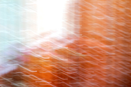 Abstract motion blur background. Orange light. Blurred hallucinations psychedelic design. Out of focus.の写真素材