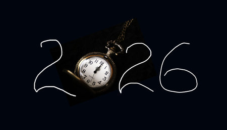 A striking banner with a handwritten 2026 text, a bold contrast against the sleek, black background....