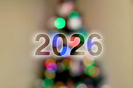 festive image of the number 2026 with a beautiful bokeh effect. a blurred Christmas tree in the...