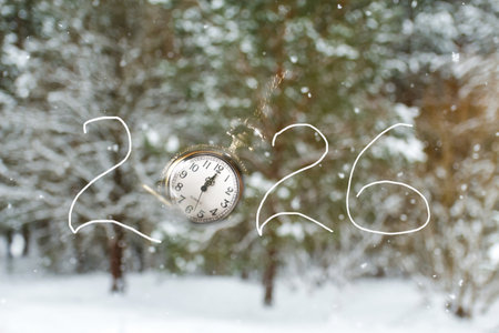 a watch on a simple background, with a focus on the numbers 2026 and a professional and an elegant design. symbol of a new year and a new beginning. 2026 new year time beginning.の写真素材