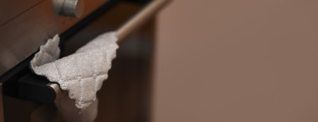 home cleaning banner rag oven copy space. gray a rag near a kitchen oven, designed with clear copy space. home products cleaning concept.の写真素材
