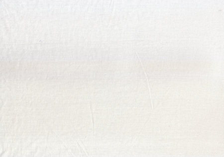 A white cotton fabric Background. A fabric for making t-shirt or comfortable apparel.の写真素材