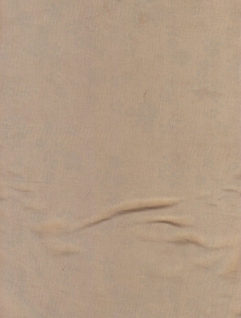 A brown color cloth background with a little wrinkle.の写真素材