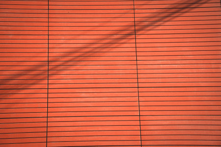 Red wall tiles Background in the afternoon. ceramics tali.の写真素材