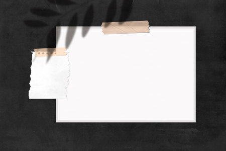 Mood board mock up in a black paper board with a piece of noteの写真素材