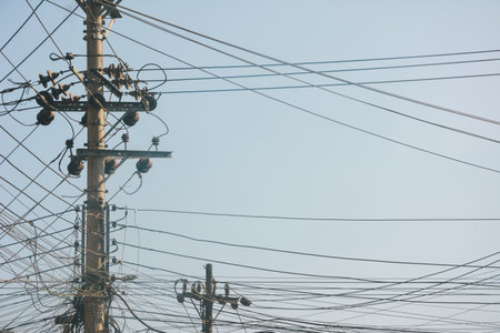 Electric line cables pole with wiresの写真素材