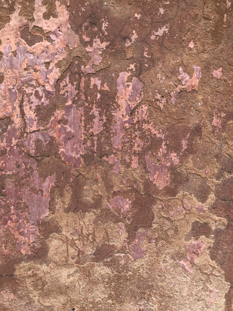 Old weathered pink wall surfaceの写真素材