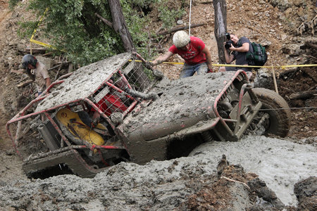 Photographer is taking Picture of 4wd off-road vehicle in mudのeditorial素材