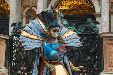 Woman Venetian Mask in colorful and elegant costumeの写真素材