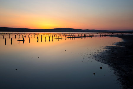 Old Saline with beautiful sunset - sea landscape - Salt production field, island Pag, Croatiaの写真素材