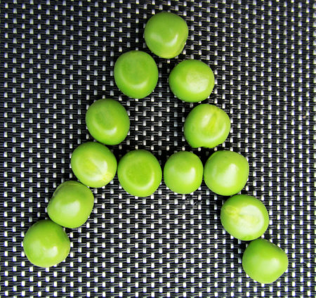 Letter a lined green peas