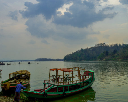 Landscape of Kaptai lake after rain with boat.のeditorial素材