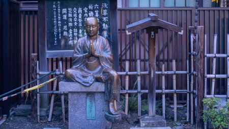 Tokyo, Japan - August 2018: Nadebotoke - Pindola statue that was believed to heal injuries at Sensoji temple in Asakusa, Tokyo, Japanのeditorial素材