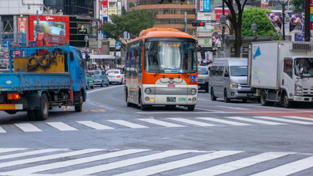 Tokyo, Japan - August 2018: A bus with a cute dog face at Shibuya crossingのeditorial素材