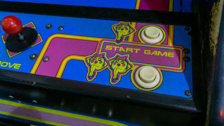 San Francisco, USA - August 2019: Start buttons for Ms Pacman arcade machineのeditorial素材