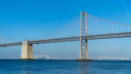 San Francisco, USA - August 2019: Bay Bridge during day on a clear skyのeditorial素材