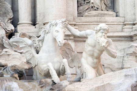 Close up view of Triton with conch and seahorse statues of the Trevi Fountain in Rome, Italy.の写真素材