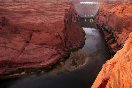 Late evening view of Glen Canyon Dam and the Colorado River in Page, Arizona.の写真素材