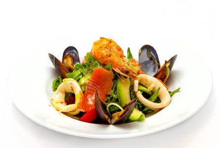 krevedko salad, mussels, squid, salmon, avocado and arugulaの写真素材